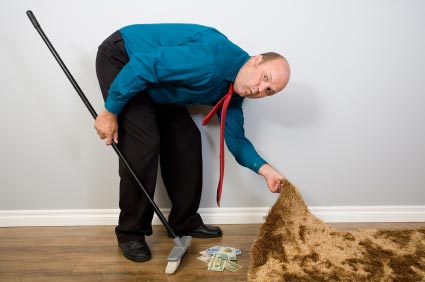 Sweeping-$-under-rug.jpg
