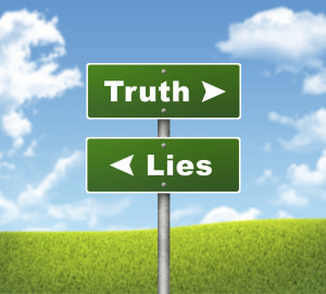 Crossroads road sign. Pointer to the right Truth, but Lies left. Choice concept