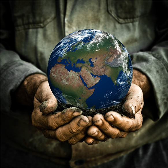 Hands holding globe