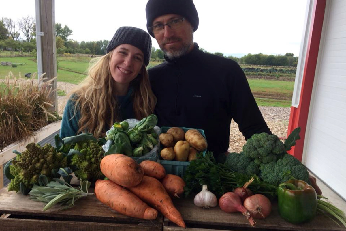 Andy and Melissa Dunham with farm vegtables