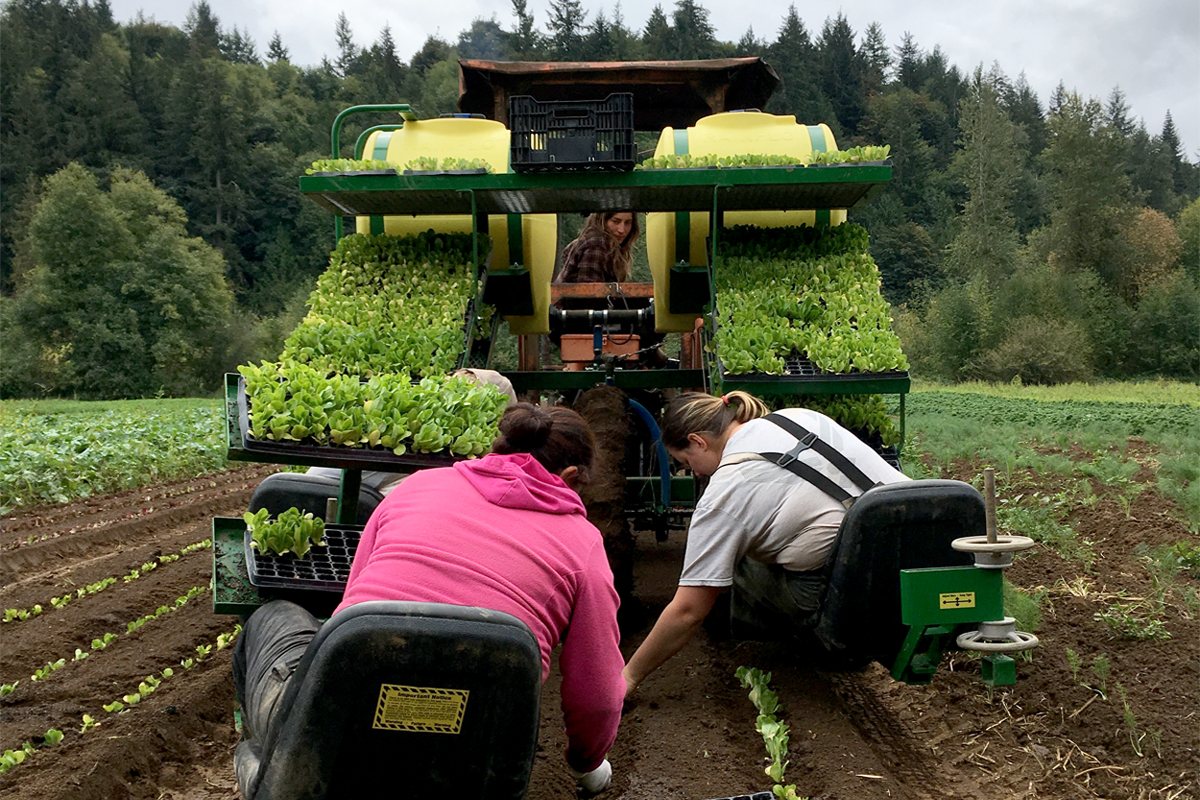 2 women at tractor on farm