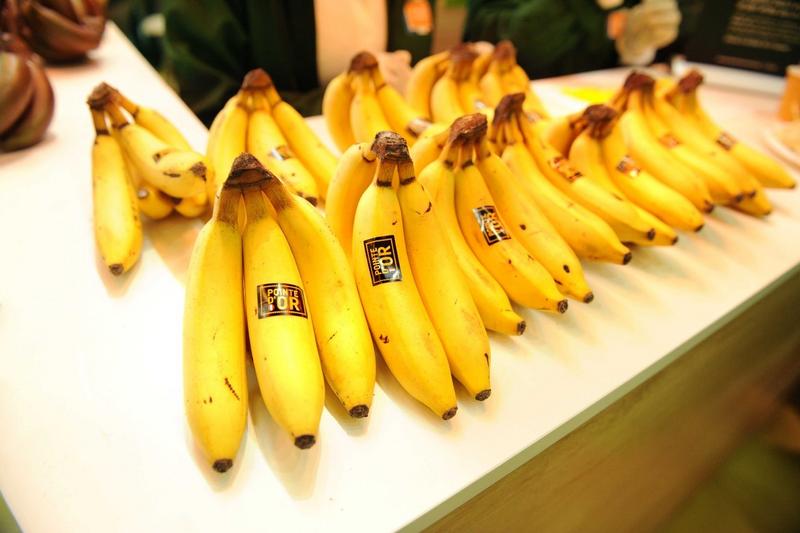 Bananas on counter with Pointe d’Or label
